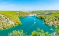 Higway over the Krka river, Croatia. View from famous bridge near the Sibenik and Skradin city. River with boat and yacht Royalty Free Stock Photo