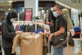 Hijab Malay Muslim lady with her son and daughter doing shopping in big modern city mall