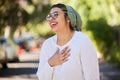 Hijab, muslim and woman in a park laughing feeling happy outdoor for religion on holiday or vacation for freedom Royalty Free Stock Photo