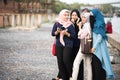 Hijab`s girl relaxing on the seaside