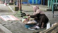 hijab woman croch on street at Bungkul Park Surabaya 09