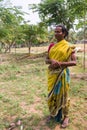 Hijra transgender person in rural setting.