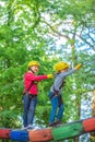 Hike and kids concept. Child boy having fun at adventure park. Climber child. Climber child on training. Kids boy