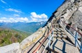 Hike on Moro Rock Staircase toward mountain top, granite dome rock formation in Sequoia National Park, Sierra Nevada mountains,