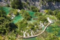 Hike path trough the lake besides the waterfall