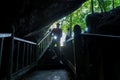 Hike to the cave. Ancient stone cave stalactites and stalagmites