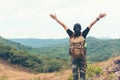 Hiker asian woman backpack raise hands happy feeling freedom good and strong weight victorious facing