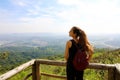 Hiker with backpack enjoying view from Jaragua Peak, Sao Paulo, Brazil