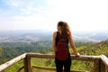 Hiker with backpack enjoying view from Jaragua Peak, Sao Paulo, Brazil