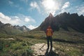 hiker with backpack hiking on high altitude mountain Royalty Free Stock Photo