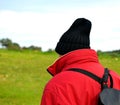 Hiker with backpack hiking in the mountains of Cordoba, Spain