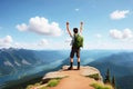 Hiker with backpack raising arms up