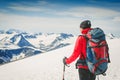 Hiker with backpack standing on top and enjoying tne view Royalty Free Stock Photo