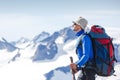 Hiker with backpack standing on top Royalty Free Stock Photo