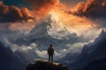 Hiker with backpack standing on top of mountain and looking at the sunset, A young man looking at a big beautiful mountain that he Royalty Free Stock Photo