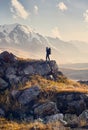 Hiker with big backpack in the mountains Royalty Free Stock Photo