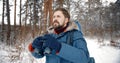 Hiker with binoculars in forest