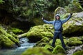 Hiker boy by the river