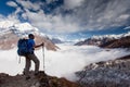 Hiker is climbig to Manaslu base camp in highlands of Himalayas