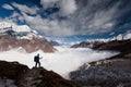 Hiker is climbig to Manaslu base camp in highlands of Himalayas Royalty Free Stock Photo