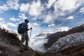 Hiker is climbig to Manaslu base camp in highlands of Himalayas