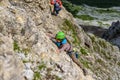 Hiker climbing in the mountain of Alps, Europe