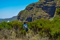 A hiker against the mountain background at Elephant Hill, Aberdare Ranges, Kenya