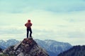 hiker enjoy the view on mountain top cliff Royalty Free Stock Photo