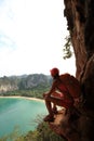 Hiker enjoy the view at sunrise mountain peak cliff Royalty Free Stock Photo