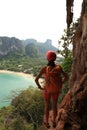 Hiker enjoy the view at sunrise mountain peak cliff Royalty Free Stock Photo