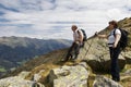 Hiker enjoying stunning view of the Alps Royalty Free Stock Photo