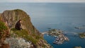 Hiker enjoying the view over Reinefjorden, Lofoten, Norway Royalty Free Stock Photo