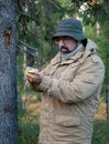 Hiker in forest .