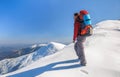 Hiker girl with backpack in a high mountains Royalty Free Stock Photo