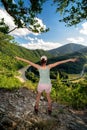 Hiker girl looking on Domasin meander of river Vah in Slovakia