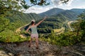 Hiker girl looking on Domasin meander of river Vah in Slovakia