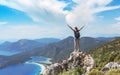 Hiker girl on the mountain top, Ñoncept of freedom, victory, active lifestyle, Oludeniz, Turkey Royalty Free Stock Photo
