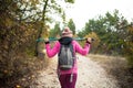 Hiker girl walking on a path in the mountains. Royalty Free Stock Photo