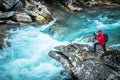 Hiker and the Glacial River