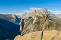 Hiker at the Glacier Point with View to Yosemite Valley and Half Dome in the Yosemite National Park, California, USA