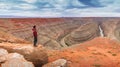 Hiker in Goosenecks State Park, Utah. USA