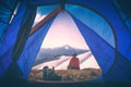 Hiker in a hat enjoy the mountain valley. Instagram stylisation Royalty Free Stock Photo