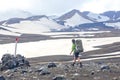 Hiker hikers are walking along the hiking trail of the Icelandic mountains. Landmannalaugar. iceland