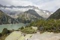 Hiker hikes through the breathtaking mountain scenery in the Alps