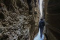 A hiker inside Black Point Fissure slot canyon Royalty Free Stock Photo