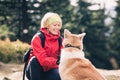 Hiker in Izerskie Mountains, Poland with dog Royalty Free Stock Photo