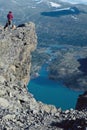 Hiker in Jotunheimen lake and mountains, Norway