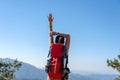 Hiker lifestyle woman happy feeling freedom good and strong weight victorious facing on the natural mountain, Royalty Free Stock Photo