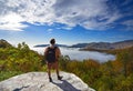 Hiker looking at beautiful autumn mountain view. Royalty Free Stock Photo