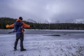 Hiker looking at Bierstadt Lake winter time Royalty Free Stock Photo